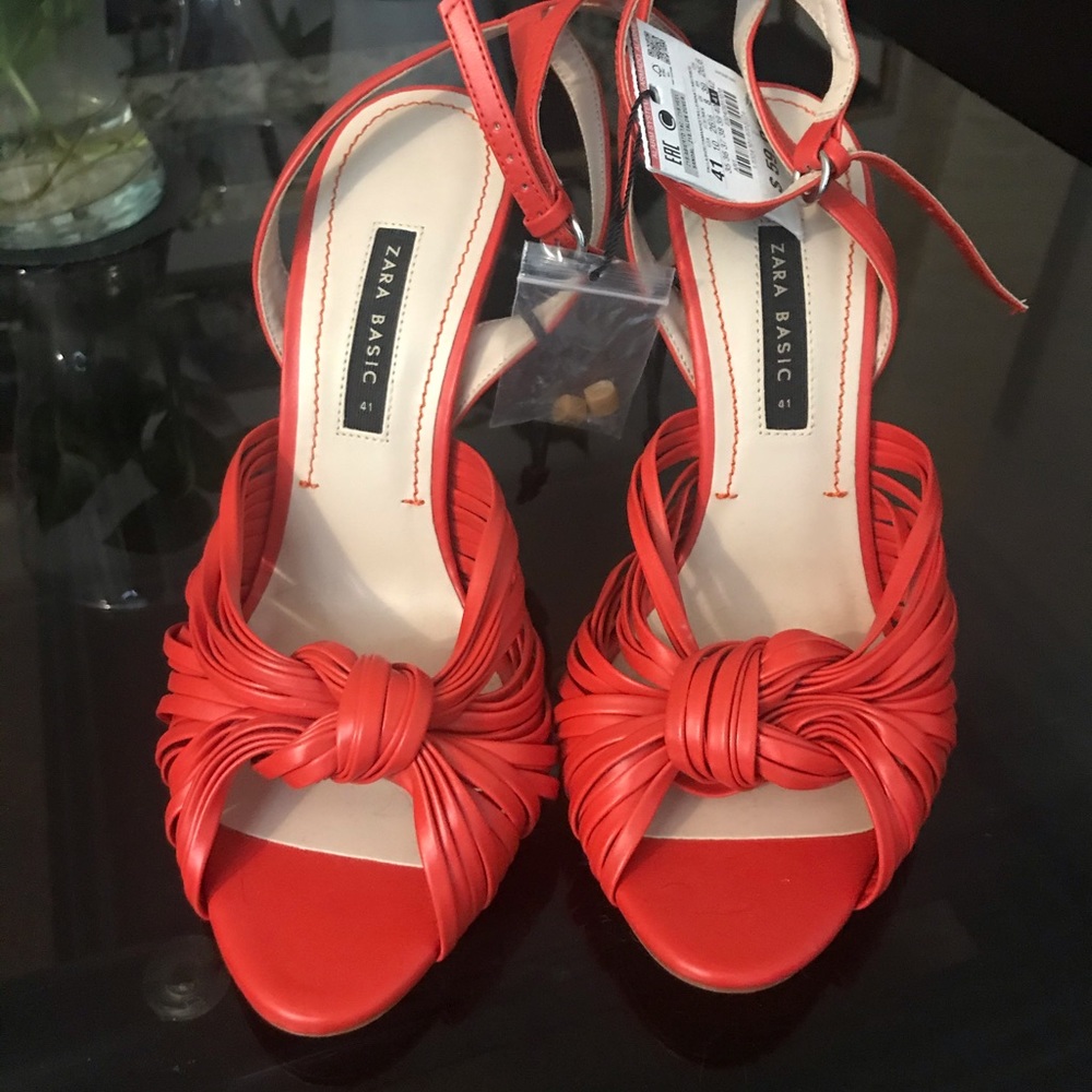 Red knotted heels
